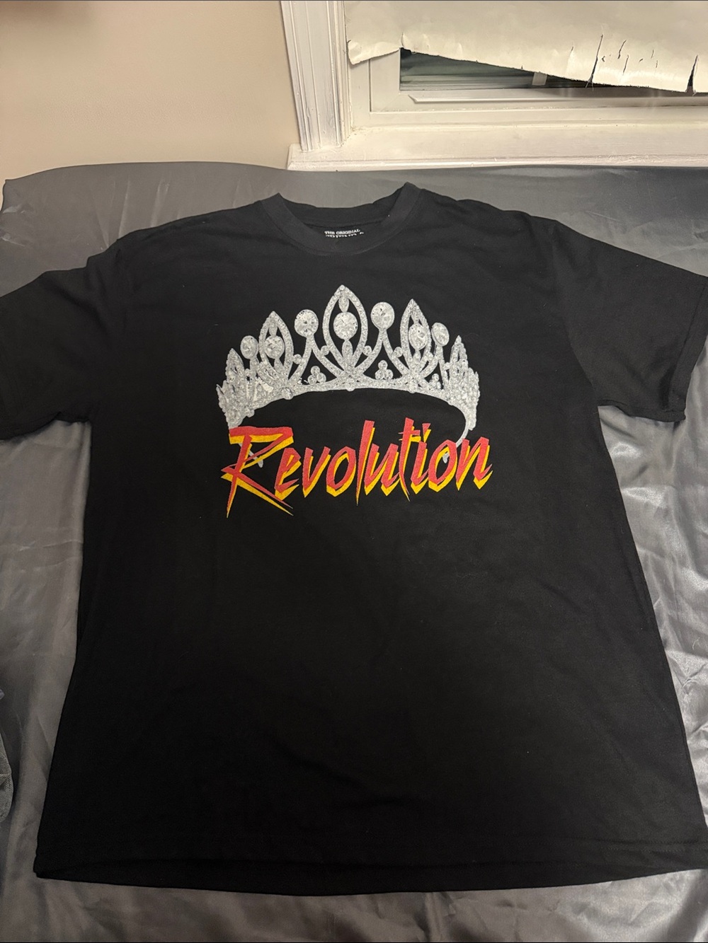Black Graphic Short Sleeve Tee with Silver Tiara and 'Revolution' Script